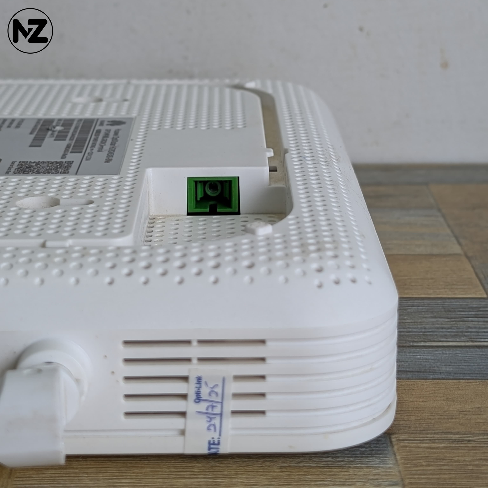 alt="Huawei HG8245x6-8Ne router with multiple LAN and WAN ports"